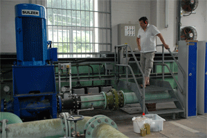 Dr Mark Trimmer sampling borehole water pumped from 90m into the chalk aquifer